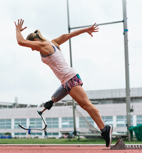 Track runner with running blade prosthetic